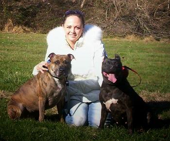 Glow with her doggies.jpg